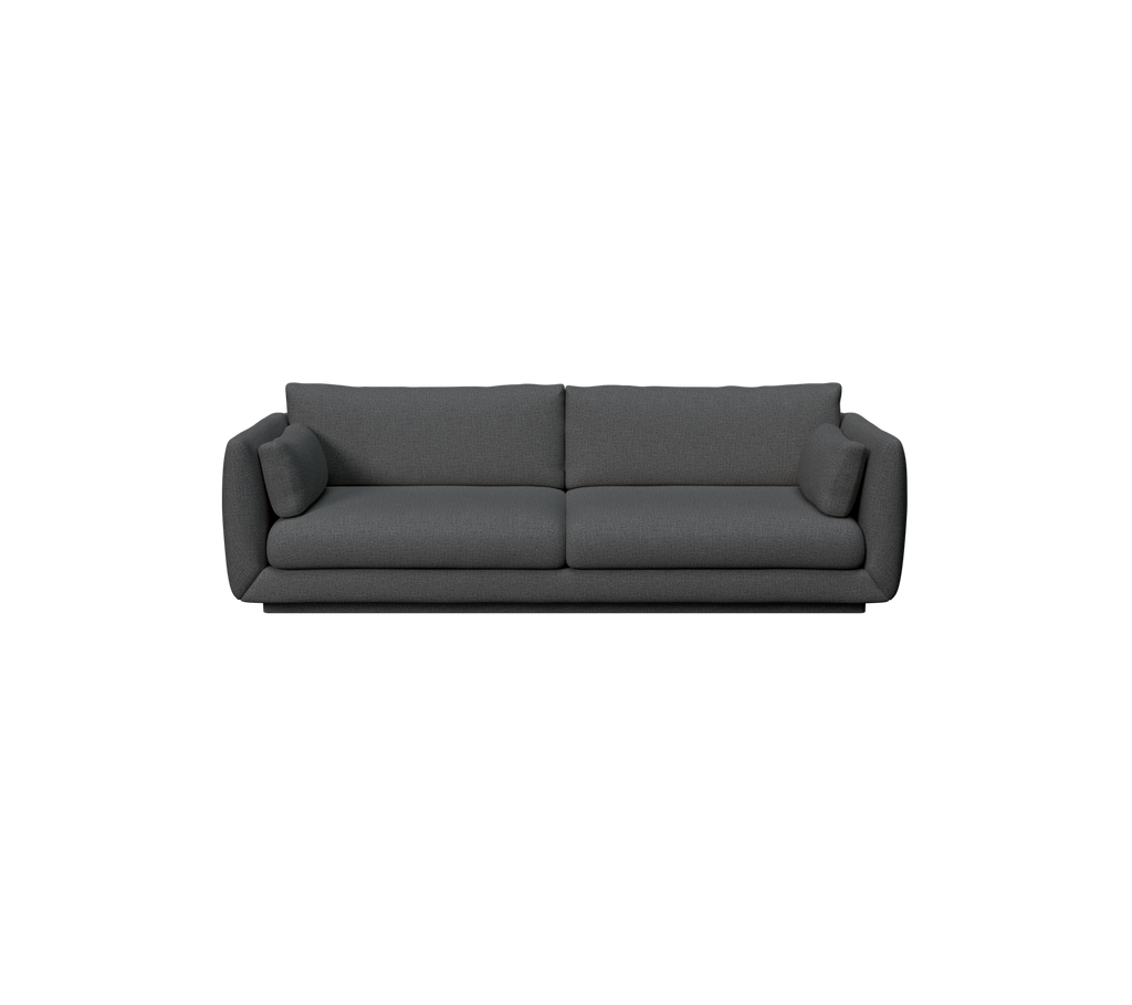 Modern dark green sofa with a sleek design and comfortable cushions.