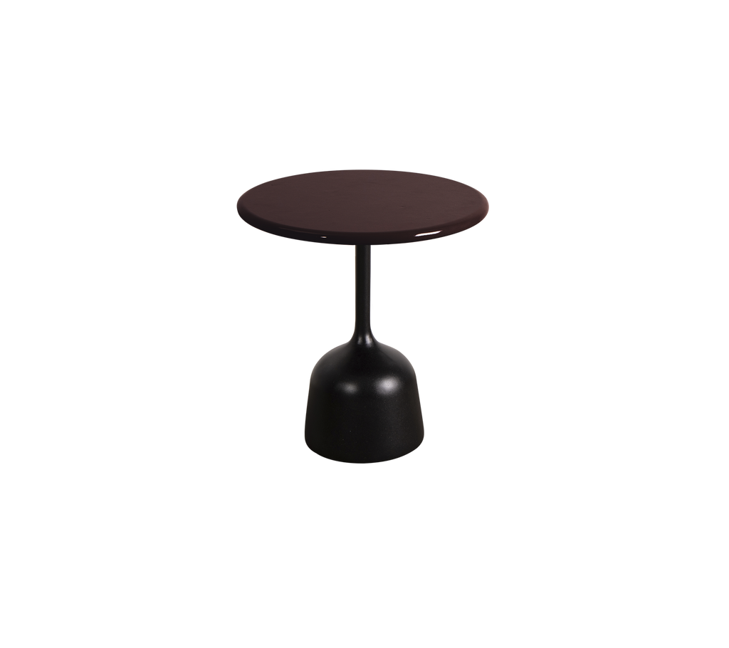 Burgundy round table with a sleek base.