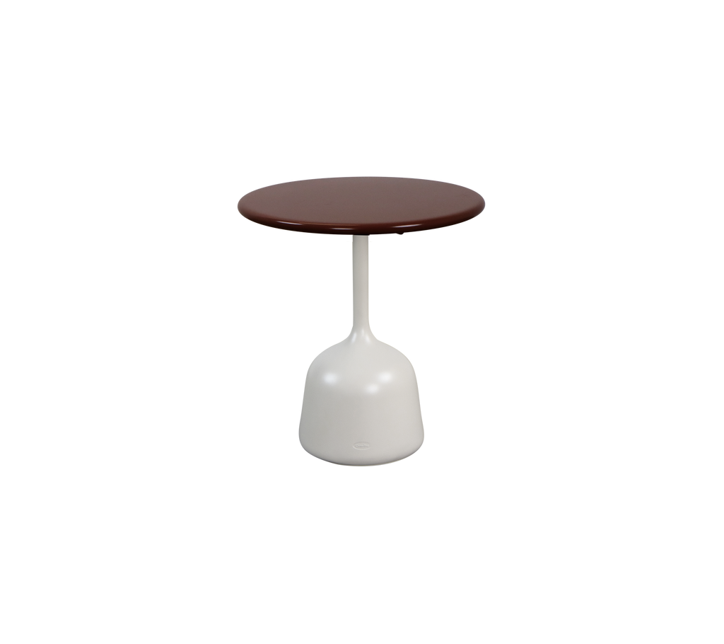 Modern burgundy table with a white base.