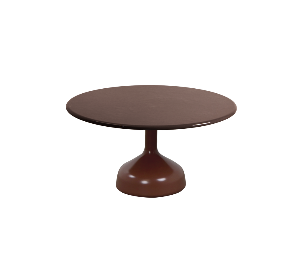Desert red round table with a pedestal base.
