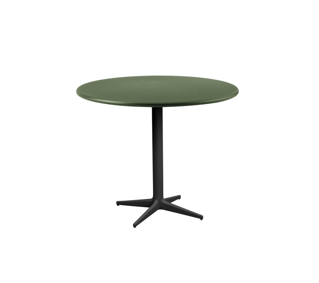 Round dark green table with a black base.