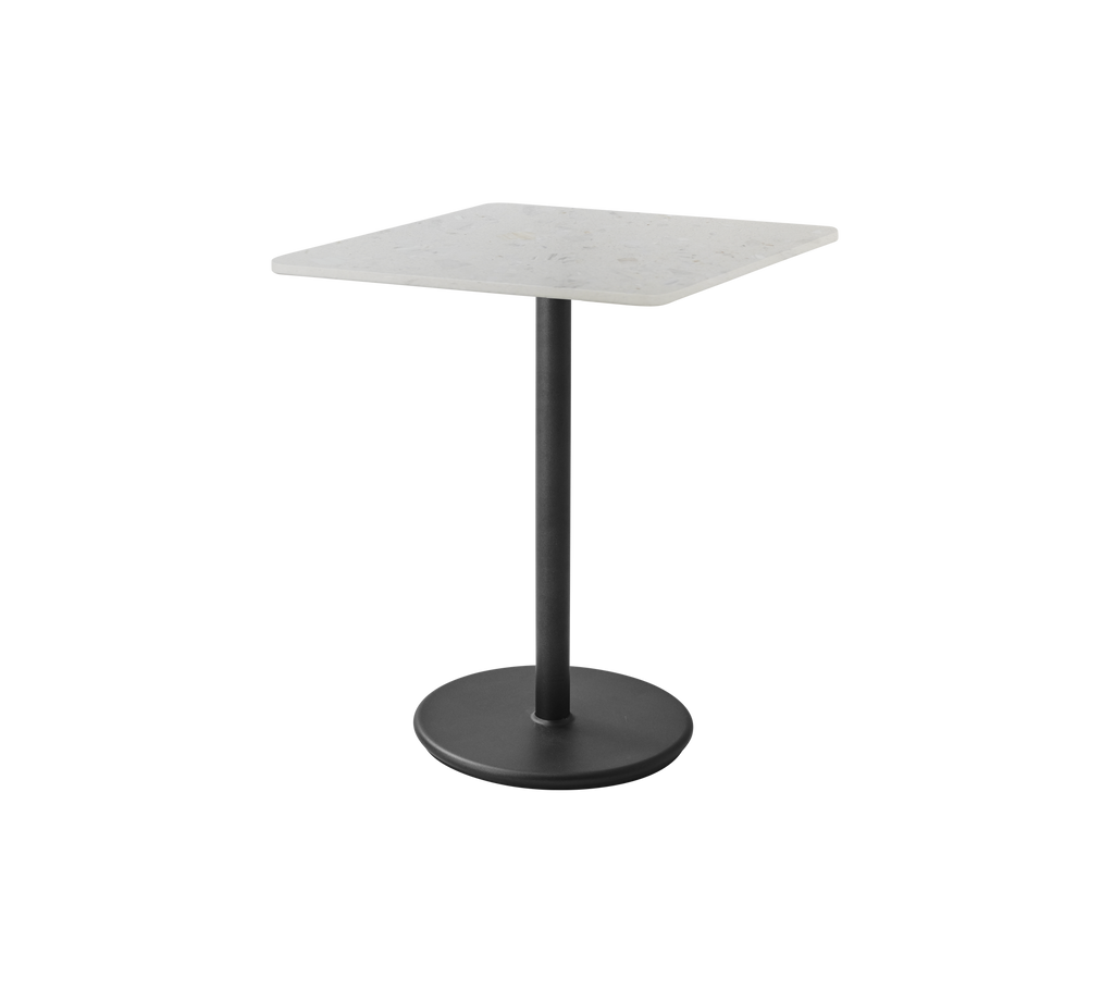 Square table with a light top and a black base.