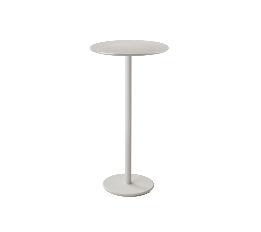Modern sand-colored table with a minimalist design.