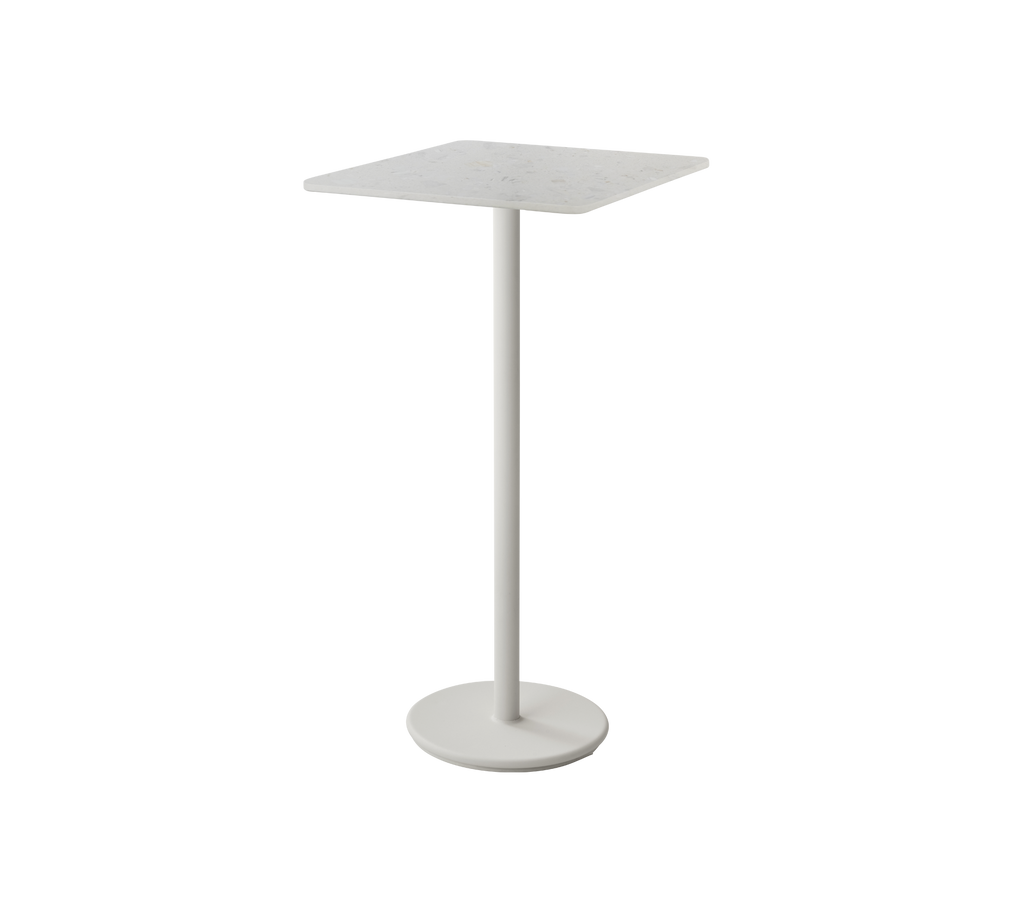 Modern white table with a sleek design.