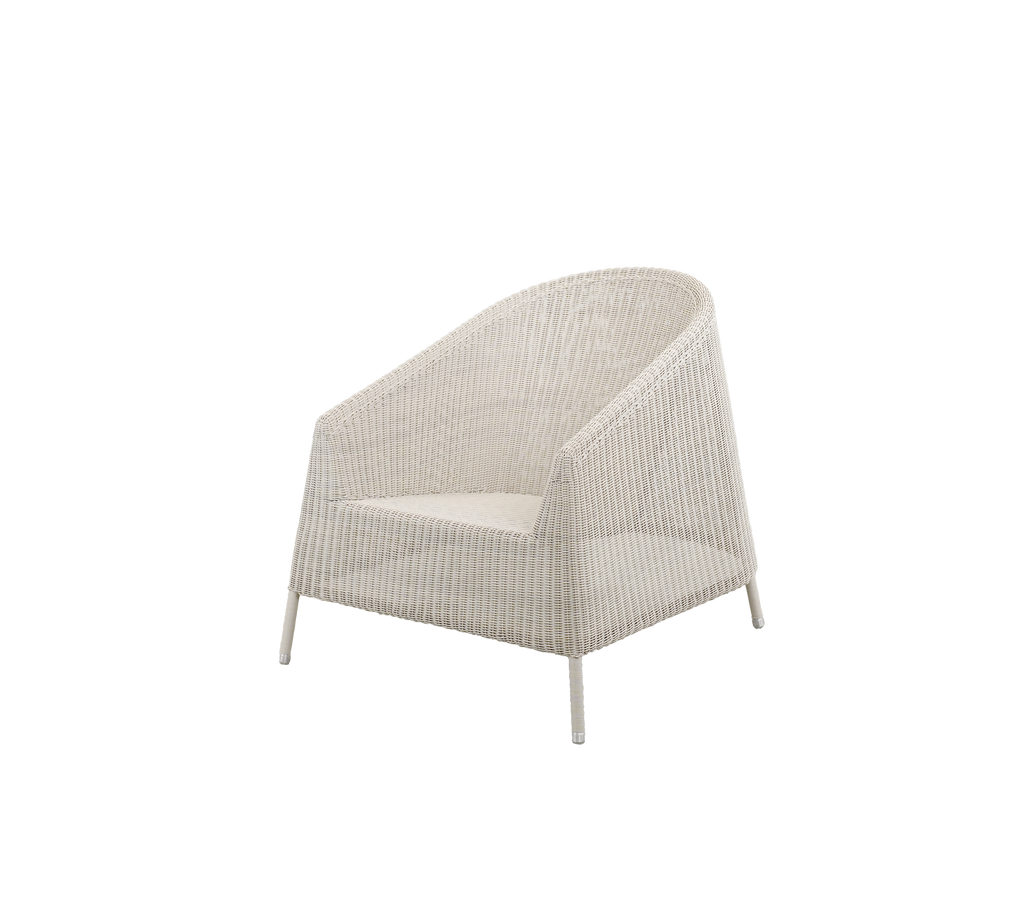 Light-colored chair with a woven design and cushion.