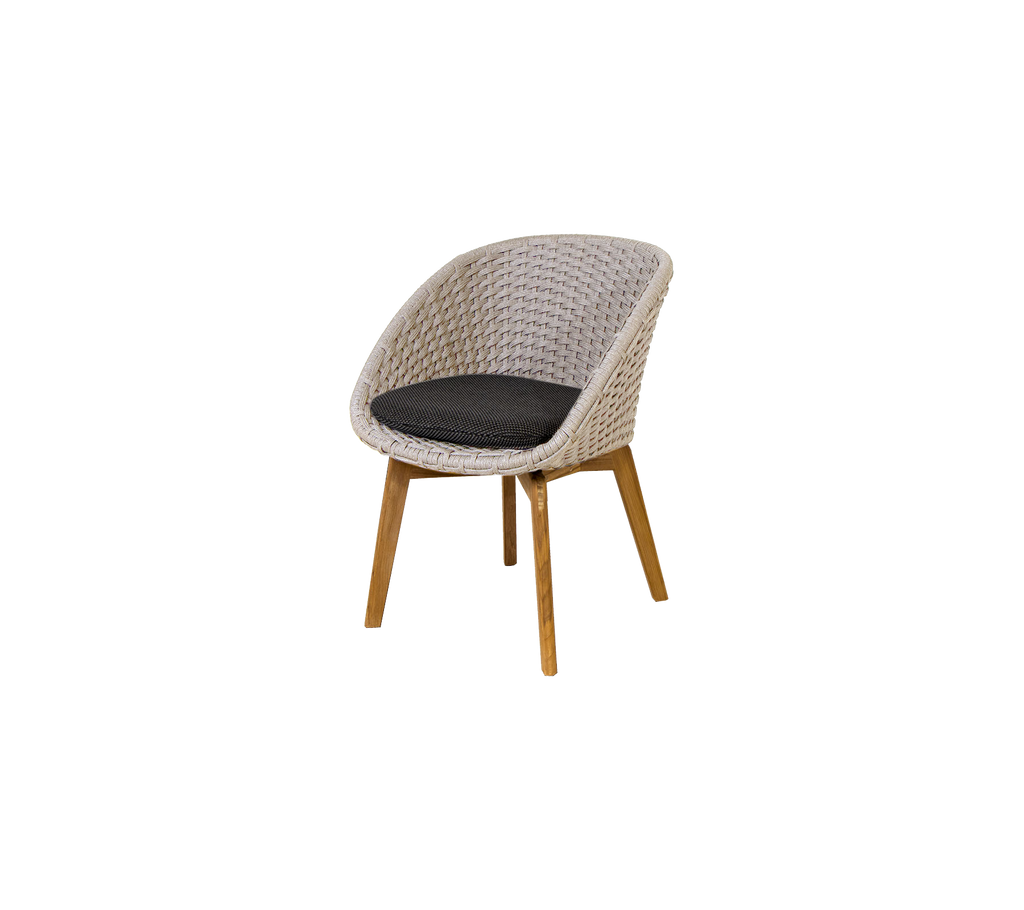 Modern sand chair with dark grey cushion.