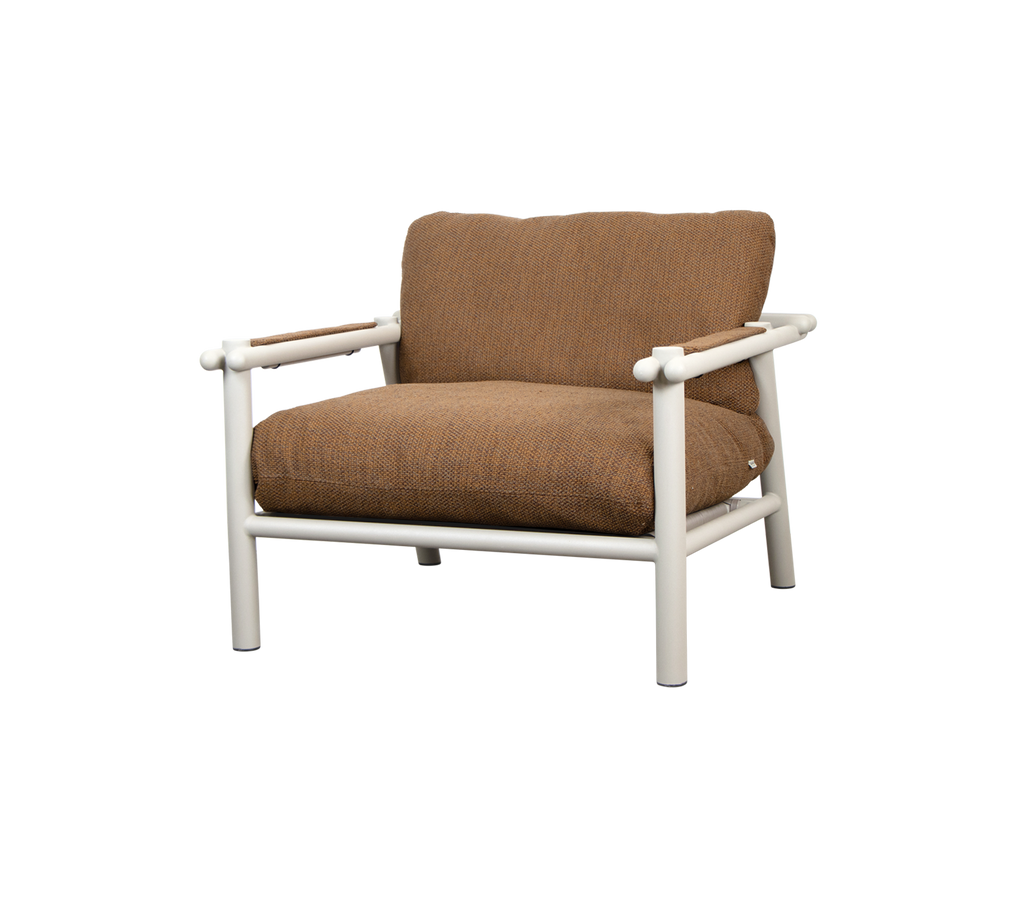 Modern chair with a brown cushion and white frame.