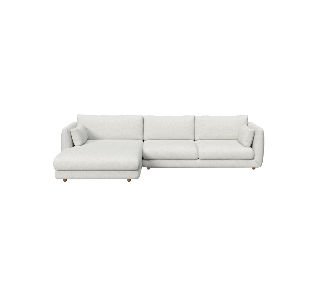 Light grey sectional sofa with minimalist design and plush cushions.