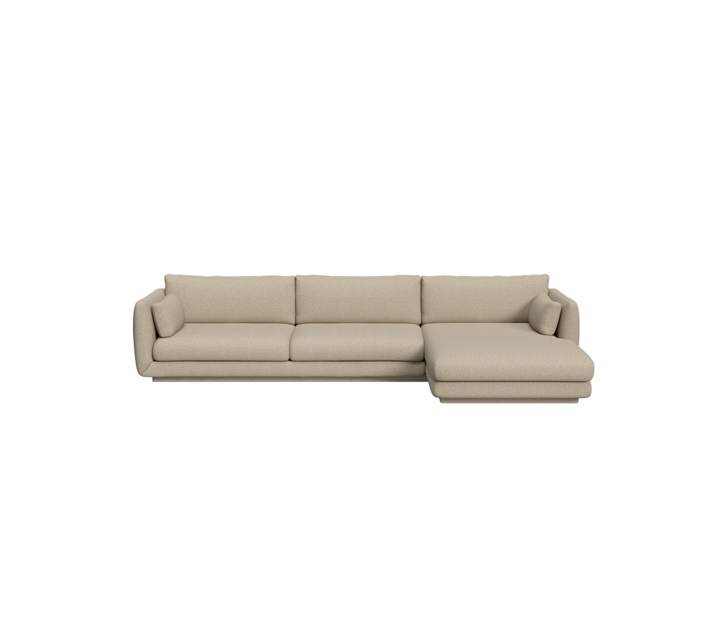 Modern brown sofa with a chaise lounge design.